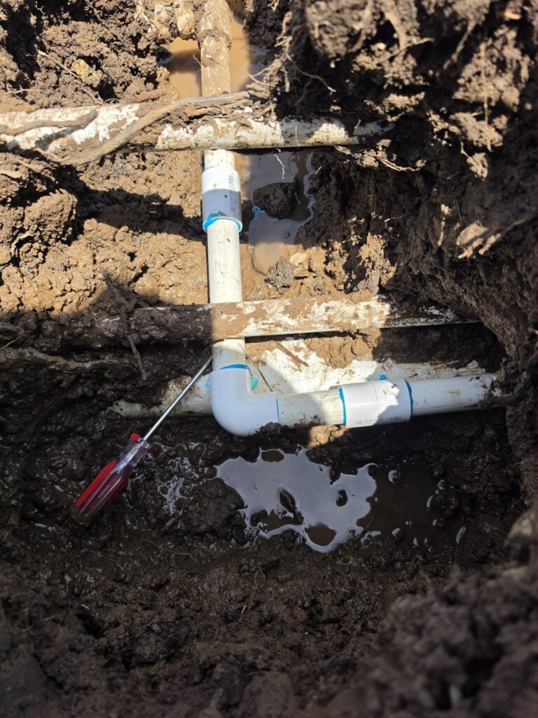 Broken pipe repair in root-entrenched ground - Evergreen Sprinklers